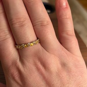 Gorgeous 360 teardrop band with lemon quartz cubic zirconia gems 360 degrees.